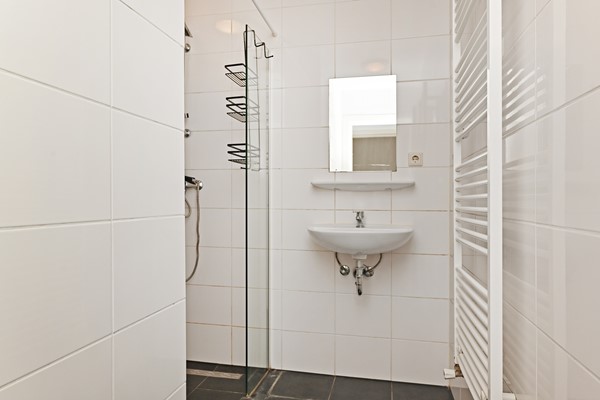 Medium property photo - Deimanstraat 309, 2522 BK Den Haag